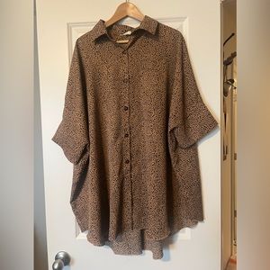 Easel animal print long flowy blouse; never worn; size L